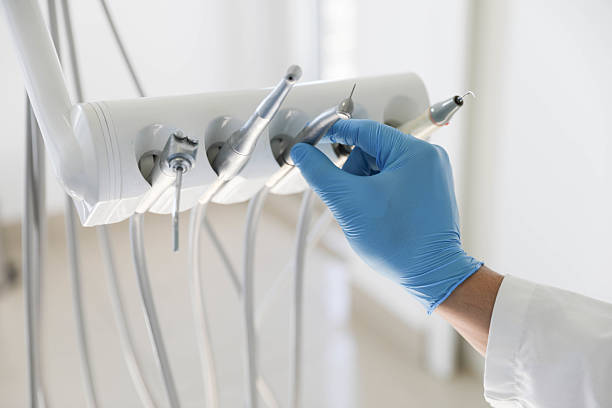 Professional Tooth Extraction technician working in Atlanta, GA